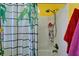 Bathroom shower stall featuring a shower curtain, adjustable shower head and storage at 2334 14Th N Ave, St Petersburg, FL 33713