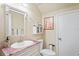 Bathroom with single vanity, toilet, and medicine cabinet at 277 Wood Dove Avenue, Tarpon Springs, FL 34689