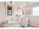 Bathroom featuring a dual sink vanity and lots of mirror space at 277 Wood Dove Avenue, Tarpon Springs, FL 34689