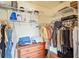 Walk-in closet with clothing racks and a dresser at 277 Wood Dove Avenue, Tarpon Springs, FL 34689