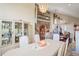 Bright dining room with a chandelier, hardwood floors, and view to the second story at 277 Wood Dove Avenue, Tarpon Springs, FL 34689