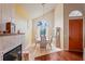 Dining room with fireplace, and large windows at 277 Wood Dove Avenue, Tarpon Springs, FL 34689