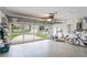 Well-maintained garage with epoxy floors and ample storage, providing a practical and organized space at 277 Wood Dove Avenue, Tarpon Springs, FL 34689