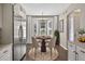Breakfast nook featuring stainless steel appliances, pendant lighting, and wood floors at 2772 Golf Lake Dr # 03, Plant City, FL 33566