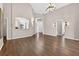 Bright living room featuring vaulted ceilings and dark wood floors at 2772 Golf Lake Dr # 03, Plant City, FL 33566