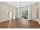 Open-concept living area with wood flooring and plenty of space for entertaining and relaxing at 2772 Golf Lake Dr # 03, Plant City, FL 33566