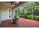 Enjoy the outdoors on this screened patio with beautiful brick pavers and a cozy stone fire pit at 2772 Golf Lake Dr # 03, Plant City, FL 33566
