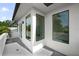 Outdoor balcony with large windows and serene view at 2803 W Aquilla St, Tampa, FL 33629