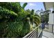 Relaxing balcony space with lush landscaping providing shade and privacy at 2803 W Aquilla St, Tampa, FL 33629