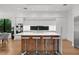 Contemporary kitchen boasts an oversized island with seating, modern appliances, and plenty of space at 2803 W Aquilla St, Tampa, FL 33629