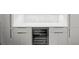 Kitchen featuring modern cabinets, countertop, and a wine refrigerator at 2803 W Aquilla St, Tampa, FL 33629