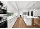 Bright, modern kitchen featuring state-of-the-art appliances and center island at 2803 W Aquilla St, Tampa, FL 33629