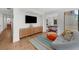 Living room featuring modern built-in cabinet and sofa at 2803 W Aquilla St, Tampa, FL 33629