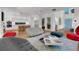 Open living space with a modern design, flowing into the kitchen area and boasting plenty of natural light at 2803 W Aquilla St, Tampa, FL 33629