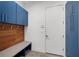 Mud room with bench seating and wall mounted hooks at 2803 W Aquilla St, Tampa, FL 33629