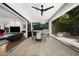 Open concept living featuring seamless indoor/outdoor living with outdoor dining, grilling, and seating at 2803 W Aquilla St, Tampa, FL 33629