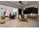 Open concept living featuring seamless indoor/outdoor living with outdoor dining, grilling, and seating at 2803 W Aquilla St, Tampa, FL 33629