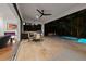 Expansive patio with outdoor kitchen, dining, seating, and seamless access to the interior at 2803 W Aquilla St, Tampa, FL 33629