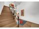 Stylish staircase with wood steps and modern metal railing at 2803 W Aquilla St, Tampa, FL 33629