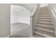 Bright entryway featuring wood-look floors, a staircase, and an archway at 3125 S Northview Rd, Plant City, FL 33566