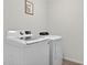 Modern laundry room with washer and dryer units and stylish decor at 3125 S Northview Rd, Plant City, FL 33566