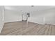 Expansive living room with lots of natural light and wood-look floors at 3125 S Northview Rd, Plant City, FL 33566