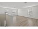 Spacious loft area with abundant natural light and wood-look flooring at 3125 S Northview Rd, Plant City, FL 33566