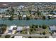 Aerial view showcasing canal-front homes and serene waterfront living at 3243 Azalea Dr, Hernando Beach, FL 34607