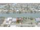 Aerial view highlighting property with pool and waterway access, defined by red outline at 3243 Azalea Dr, Hernando Beach, FL 34607