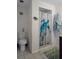 Well-maintained bathroom featuring a toilet, vanity, and tiled shower for simple functionality at 3243 Azalea Dr, Hernando Beach, FL 34607