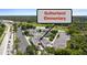 Aerial view of Sutherland Elementary, showcasing its sprawling campus, well-organized layout, and surrounding green spaces at 3350 Fox Hunt Dr, Palm Harbor, FL 34683