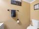 Cozy bathroom featuring modern fixtures and a humorous sign at 3350 Fox Hunt Dr, Palm Harbor, FL 34683