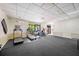 Well-lit fitness center featuring treadmills, stationary bikes, and large windows offering scenic views for an active lifestyle at 3350 Fox Hunt Dr, Palm Harbor, FL 34683