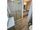 This is a bathroom with light colored cabinets and drawers plus a framed shower at 34645 Camphor N Dr, Pinellas Park, FL 33781