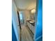 Hall bathroom with extended vanity, mirror and a view of a hall closet at 34645 Camphor N Dr, Pinellas Park, FL 33781