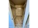 This closet features wood colored walls and flooring with racks at 34645 Camphor N Dr, Pinellas Park, FL 33781