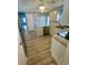 Efficient kitchen featuring an island, stainless steel appliances, and ample counter space at 34645 Camphor N Dr, Pinellas Park, FL 33781