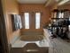 Inviting bathroom featuring a large soaking tub, peach walls, and decor at 35020 Colony Hills Dr, Zephyrhills, FL 33541
