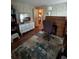 Functional home office featuring wood floors, a desk, and shelving at 35020 Colony Hills Dr, Zephyrhills, FL 33541