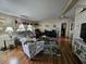 Cozy living room with comfortable seating, laminate floors, and decor at 35020 Colony Hills Dr, Zephyrhills, FL 33541