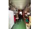Long storage room with full shelving units and plenty of space at 35020 Colony Hills Dr, Zephyrhills, FL 33541