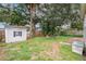 View of backyard featuring storage shed at 3503 W Palmira Ave, Tampa, FL 33629