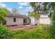 View of backyard patio with seating at 3503 W Palmira Ave, Tampa, FL 33629