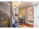 A view of laundry room and storage space with a washer, dryer, and shelving at 3503 W Palmira Ave, Tampa, FL 33629