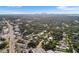 Wide aerial view of the community with the cityscape in the distance at 3622 W Mullen Ave, Tampa, FL 33609
