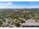 An aerial view of the neighborhood with the ocean in the distance at 3622 W Mullen Ave, Tampa, FL 33609
