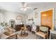 Bright living room with terrazzo flooring, decorative accents, natural light and ceiling fan at 3622 W Mullen Ave, Tampa, FL 33609