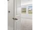 Bright bathroom showcasing a shower and a view into the bedroom at 3655 Moscato Dr, Brooksville, FL 34602