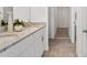 Bright bathroom featuring double sinks, granite countertops, and modern fixtures at 3655 Moscato Dr, Brooksville, FL 34602