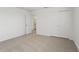 Bedroom with plush carpeting, closet, and access to the ensuite bathroom at 3655 Moscato Dr, Brooksville, FL 34602